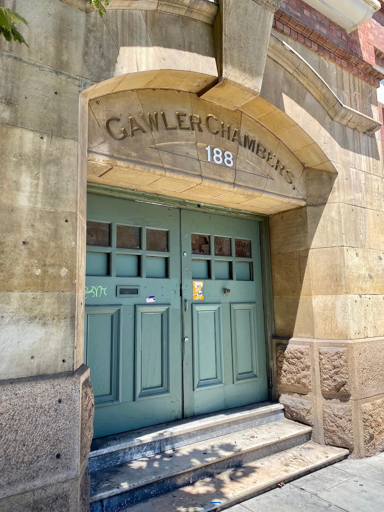 Stone-framed entrance doors of Gawler Chambers on North Terrace, Adelaide